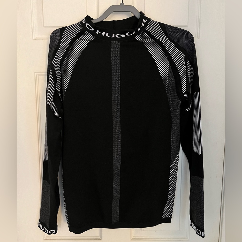 Hugo boss form fitting and super stretchy. Great condition, worn only twice.